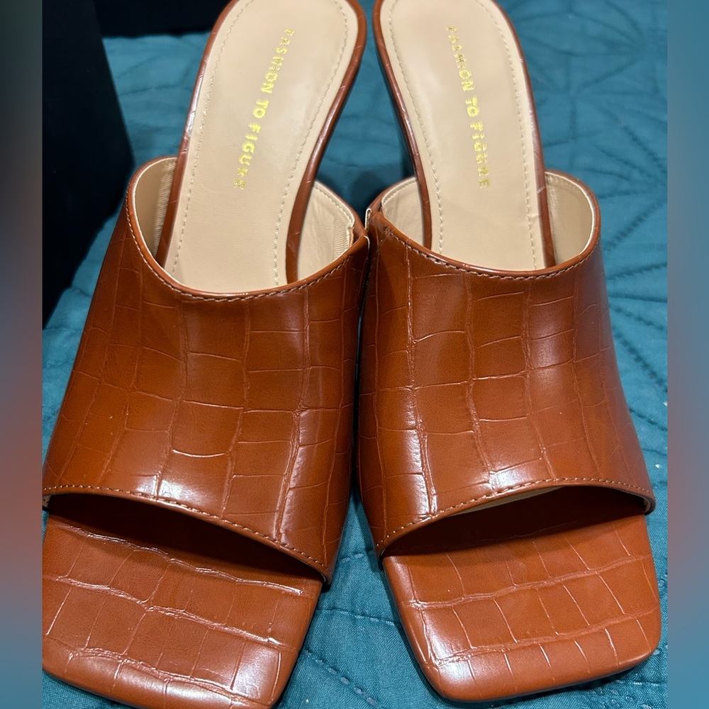 Offered in true wide widths that are so easy to wear 
• Heel Height: 4"-8 WIDE